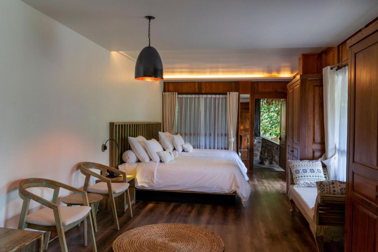 Tira Vilagna Suites & Spa Кинтамани Экстерьер фото